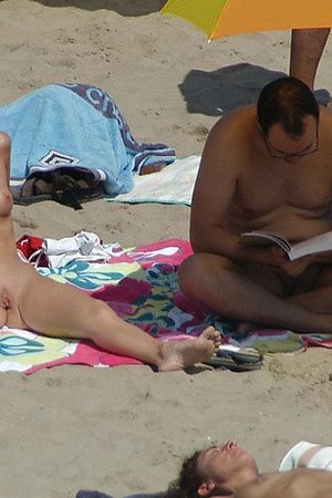 A bikini babe going topless on the Copacabana