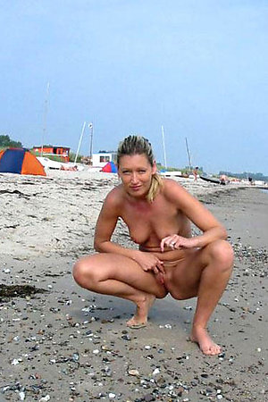 A slim girl posing on the Plakias