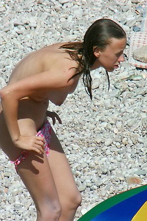 Voyeur photos of nude girls on beach - series of shots