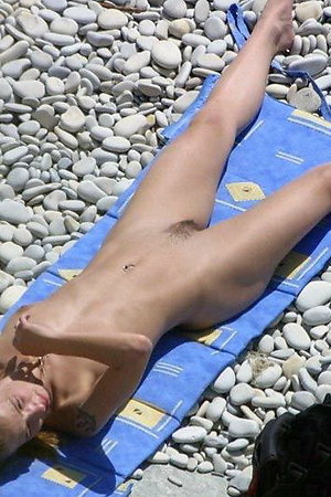 Voyeur photos of nude women on beach