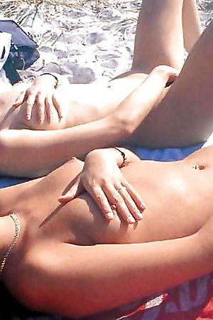 Naked girl and nude pussy on the beach