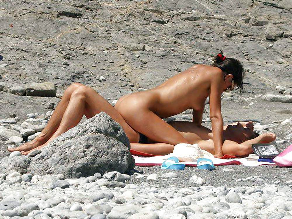 Perfect babes sunbathes nude on the beach.